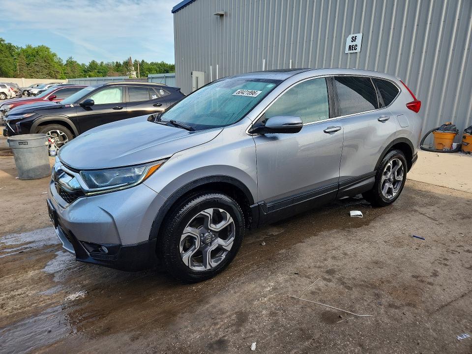 2018 Honda Cr-v VIN 7FARW2H50JE099542 COPART salvage auction — HAIL, Wi - Certificate Of Title, sold $8,300 on 2026-07-27 (photo 1)