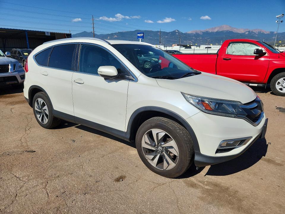 2015 Honda Cr-v VIN 5J6RM4H9XFL070029 COPART salvage auction — HAIL, Co - Certificate Of Title, sold $9,400 on 2026-08-19 (photo 4)