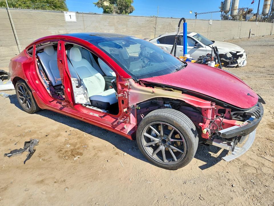 2023 Tesla Model 3 VIN 5YJ3E1EA7PF551639 COPART salvage auction — SIDE, Salvage Title, sold $6,400 on 2026-07-17 (photo 4)