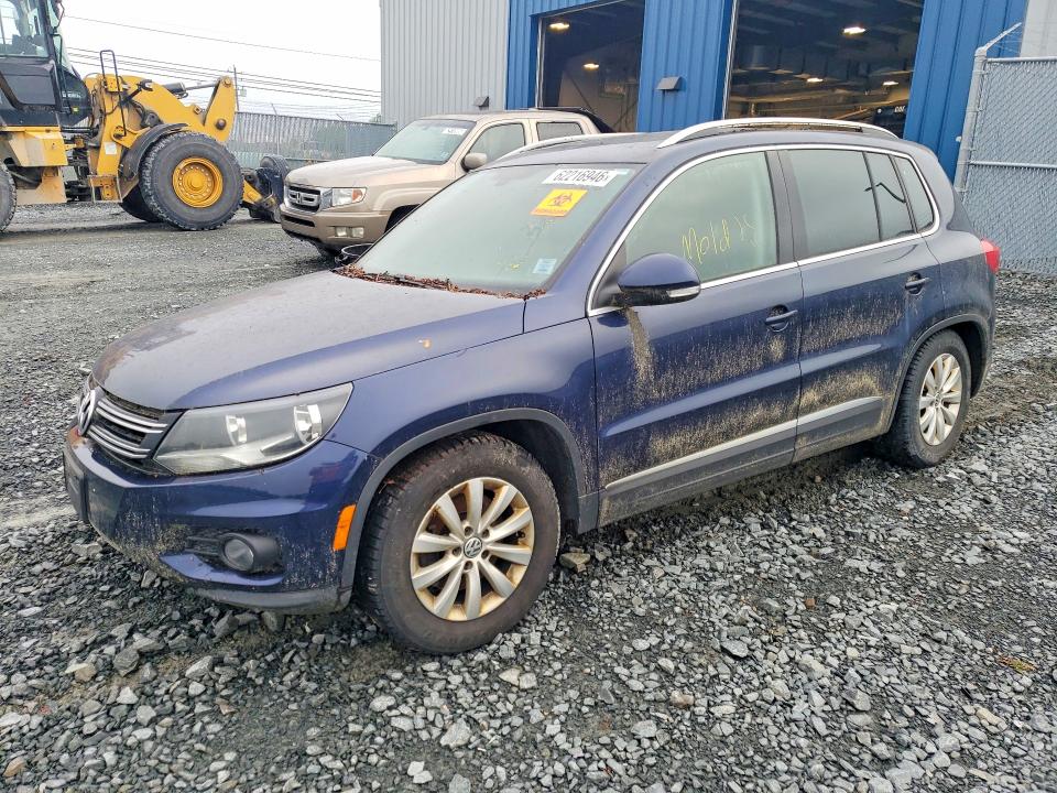 2014 Volkswagen Tiguan VIN WVGJV3AXXEW624990 COPART salvage auction — WATER/FLOOD, Ns - Cert Of Registration, sold $225 on 2026-08-13 (photo 1)