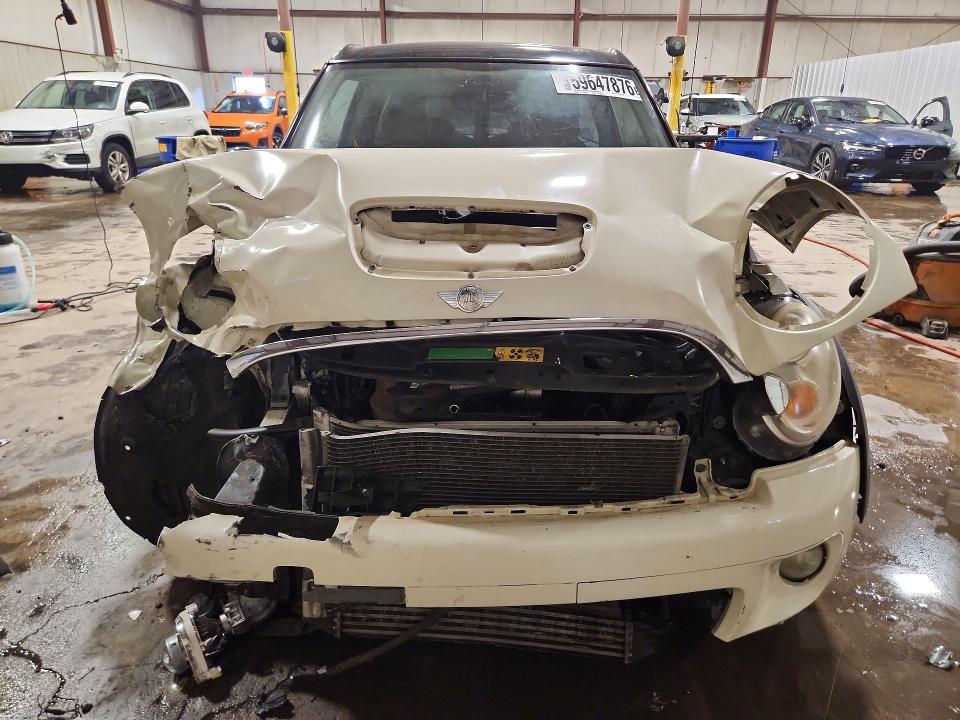 2009 Mini Cooper VIN WMWMM33599TP93578 COPART salvage auction — FRONT END, FL - CERT OF TITLE SLVG REBUILDABLE, sold $175 on 2026-07-21 (photo 5)