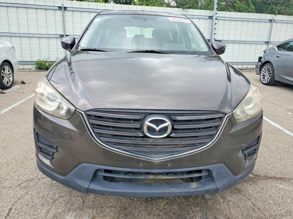 2016 Mazda VIN JM3KE4BY9G0770705 COPART salvage auction — MINOR DENT/SCRATCHES, Oh - Certificate Of Title, sold $1,800 on 2026-07-22 (photo 5)