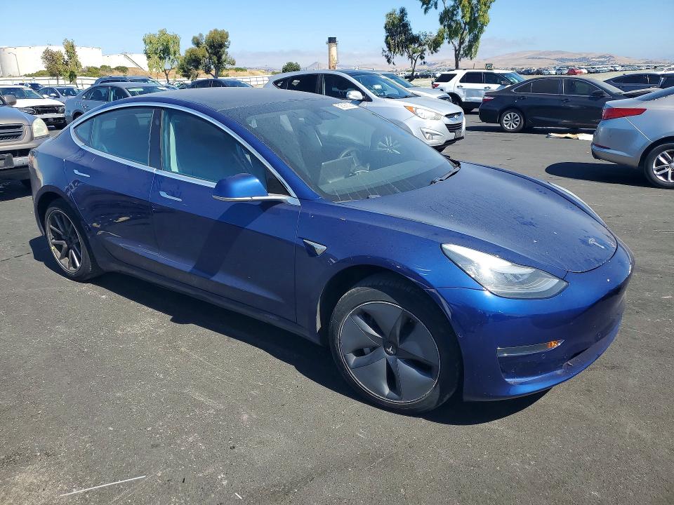 2020 Tesla Model 3 VIN 5YJ3E1EA0LF706042 COPART salvage auction — SIDE, Ca - Salvage Certificate, sold $6,300 on 2026-07-22 (photo 4)
