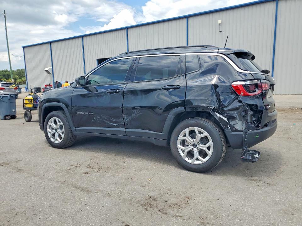 2025 Jeep Compass VIN 3C4NJDBN8ST588206 COPART salvage auction — SIDE, Fl - Cert Of Title Slvg Rebuildable, sold $7,900 on 2026-08-14 (photo 2)