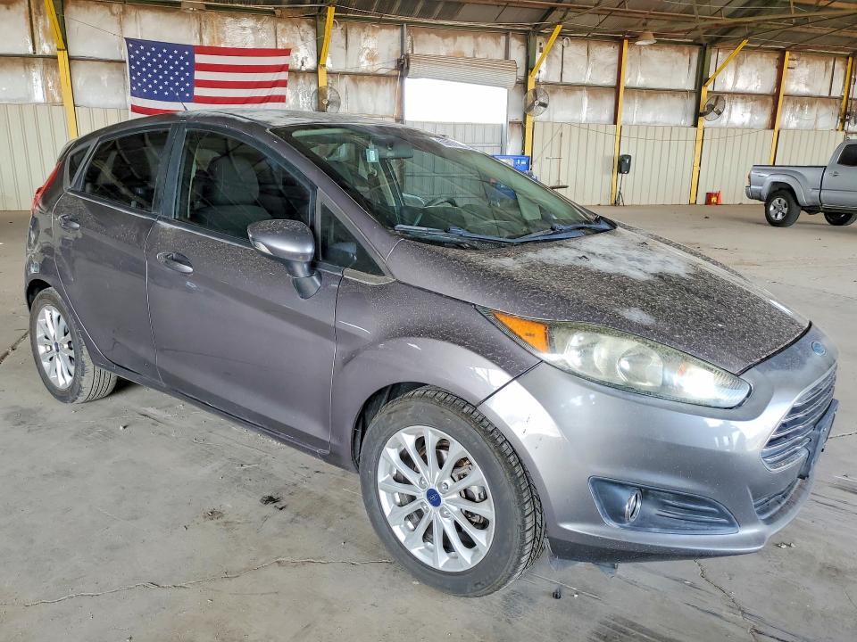 2014 Ford Fiesta VIN 3FADP4EJ9EM182989 COPART salvage auction — NORMAL WEAR, AZ - CERTIFICATE OF TITLE, sold $1,100 on 2026-07-22 (photo 4)