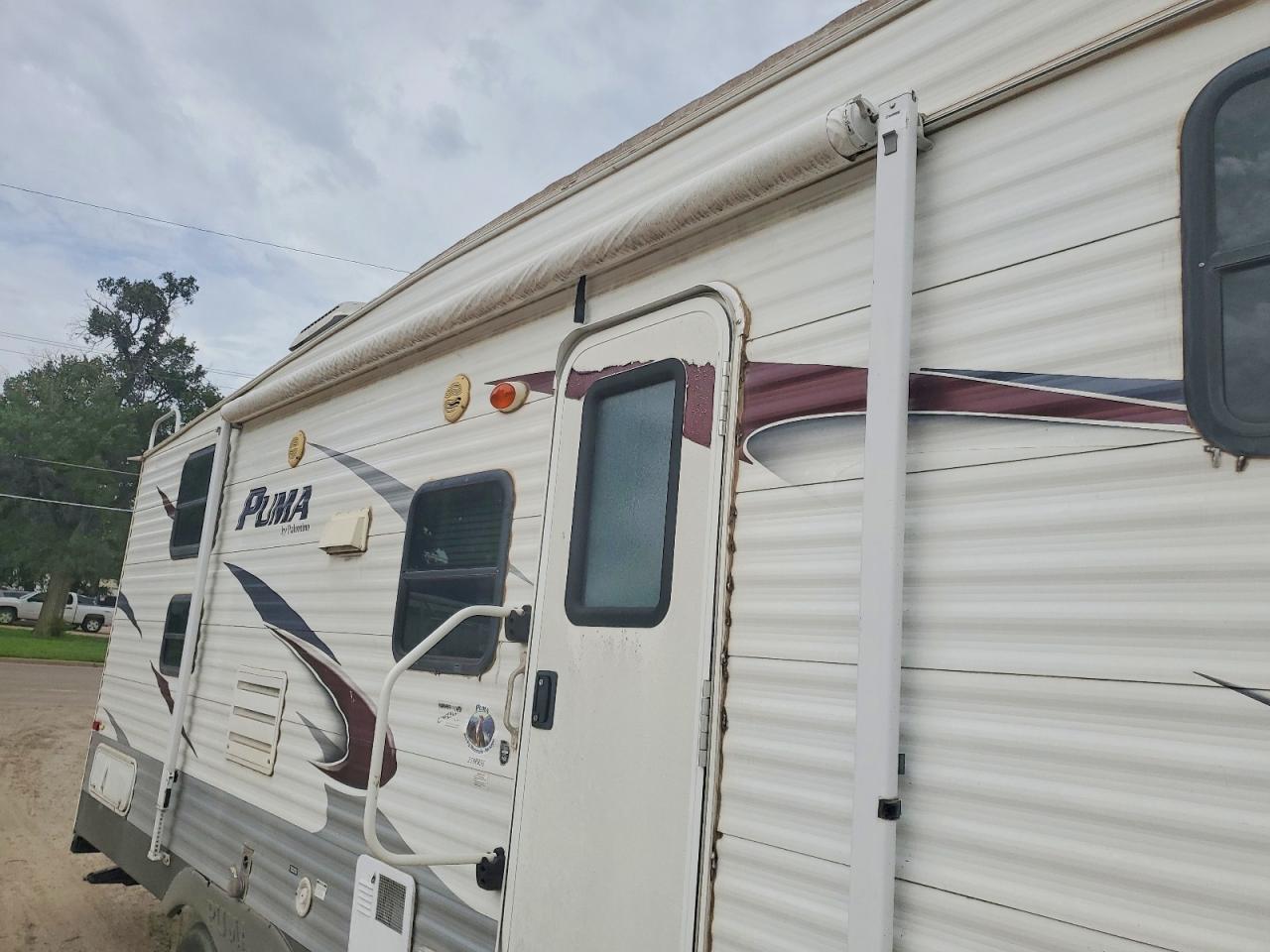 2012 Palomino Pum259rbss VIN 4X4FPUA27CP036724 COPART salvage auction — Hail, KS - CERT OF TITLE-SALVAGE (P), sold $3,150 on 2026-07-09 (photo 9)