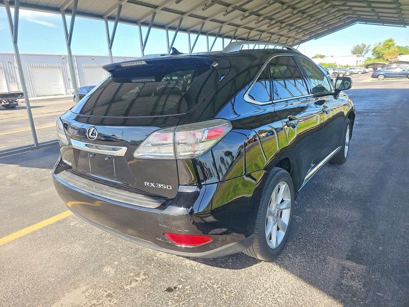 2010 Lexus Rx VIN JTJZK1BA0A2400480 COPART salvage auction — MINOR DENT/SCRATCHES, Fl - Certificate Of Title (P), sold $200 on 2026-07-17 (photo 4)