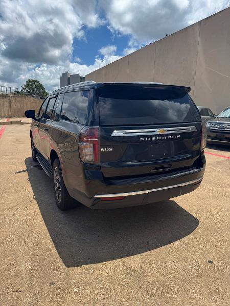 2023 Chevrolet Suburban VIN 1GNSKBKD0PR149617 COPART salvage auction — NORMAL WEAR, Tx - Cert Of Title-Rebuilt Salvage (P), sold $16,100 on 2026-07-28 (photo 4)