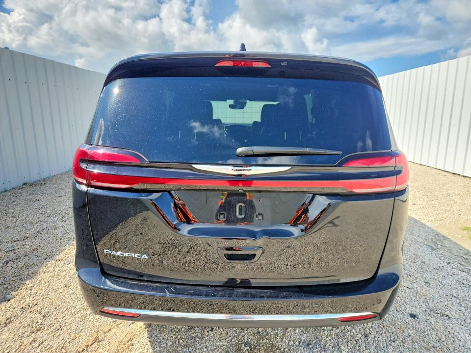 2025 Chrysler Pacifica VIN 2C4RC1BGXSR614318 COPART salvage auction — SIDE, Tx - Certificate Of Title, sold $19,000 on 2026-08-19 (photo 6)