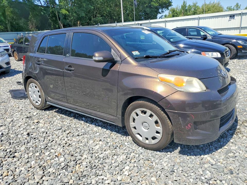 2011 Scion Xd VIN JTKKU4B49B1009175 COPART salvage auction — SIDE, MA - CERT OF TITLE-SALVAGE, sold $1,100 on 2026-09-09 (photo 4)