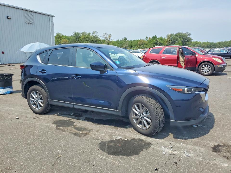 2023 Mazda Cx-5 VIN JM3KFBBM6P0144754 COPART salvage auction — REAR END, Fl - Cert Of Title Slvg Rebuildable, sold $7,100 on 2026-09-09 (photo 4)