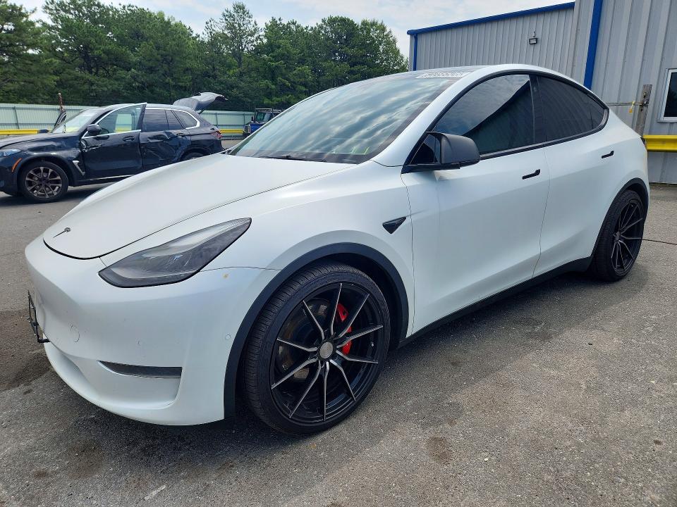 2022 Tesla Model y VIN 7SAYGDEF6NF308174 COPART salvage auction — MINOR DENT/SCRATCHES, Ny - Certificate Of Title (P), sold $12,700 on 2026-07-28 (photo 1)