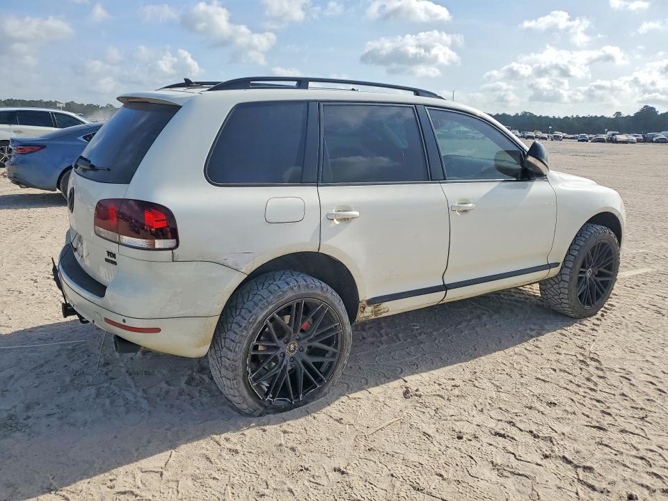 2010 Volkswagen Touareg VIN WVGFK7A93AD000946 COPART salvage auction — SIDE, TX - SALVAGE VEHICLE TITLE (P), sold $1,600 on 2026-08-07 (photo 3)
