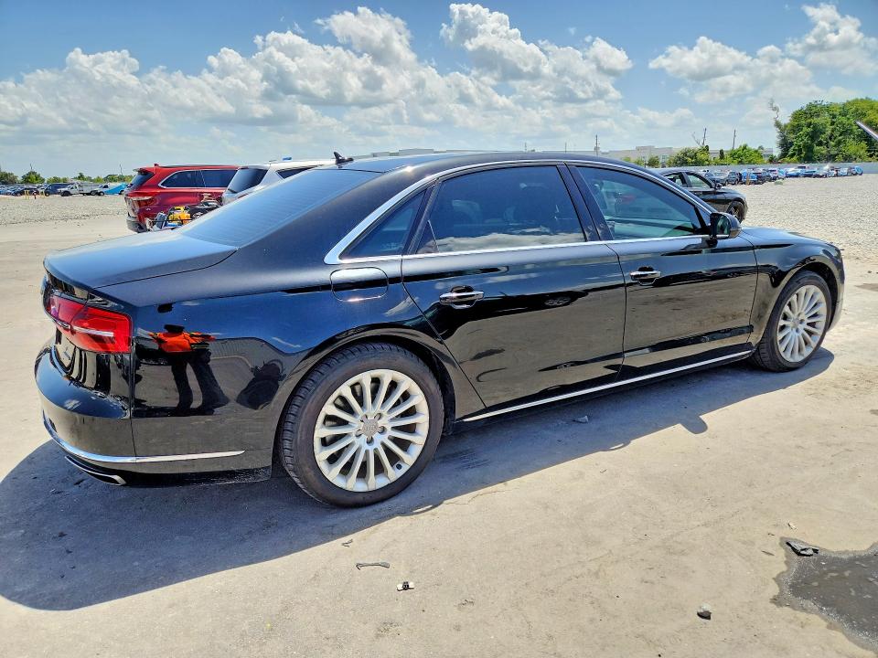 2016 Audi A8 VIN WAU34AFD7GN014621 COPART salvage auction — NORMAL WEAR, Fl - Certificate Of Title, sold $900 on 2026-07-29 (photo 3)