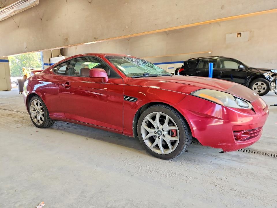 2007 Hyundai Tiburon VIN KMHHN66F57U253137 COPART salvage auction — ROOF, Va - Cert Of Title - Salvage, sold $425 on 2026-07-31 (photo 4)