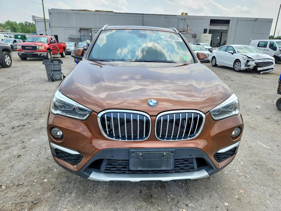 2017 BMW X1 VIN WBXHU7C3XH5H32940 COPART salvage auction — MINOR DENT/SCRATCHES, VA - CERTIFICATE OF TITLE, sold $2,550 on 2026-07-22 (photo 5)