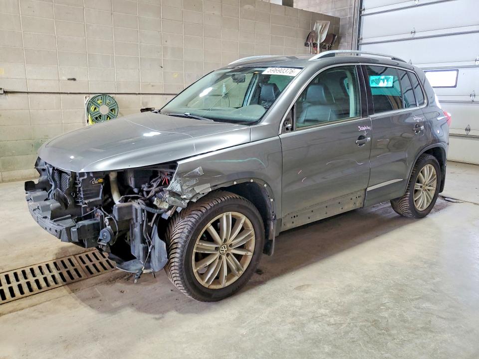 2014 Volkswagen Tiguan VIN WVGBV3AX1EW536530 COPART salvage auction — FRONT END, MN - CERT OF TITLE-PRIOR SALVAGE, sold $525 on 2026-08-06 (photo 1)