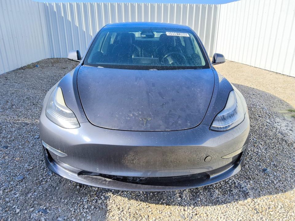 2018 Tesla Model 3 VIN 5YJ3E1EB7JF185035 COPART salvage auction — NORMAL WEAR, Fl - Certificate Of Title, sold $10,900 on 2026-07-28 (photo 5)
