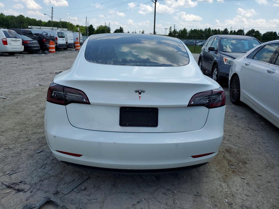 2022 Tesla Model 3 VIN 5YJ3E1EA5NF111979 COPART salvage auction — MINOR DENT/SCRATCHES, Oh - Dealer Only Clean Title (P), sold $11,600 on 2026-07-31 (photo 6)