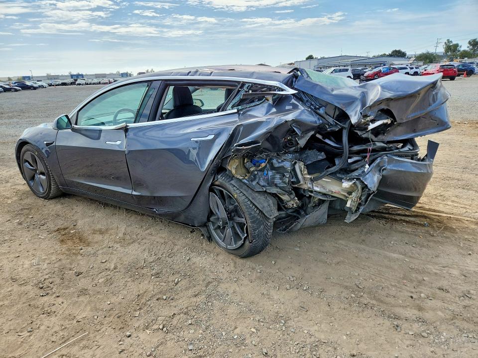 2017 Tesla Model 3 VIN 5YJ3E1EA5HF001261 COPART salvage auction — REAR END, Salvage Title, sold $2,500 on 2026-09-01 (photo 2)
