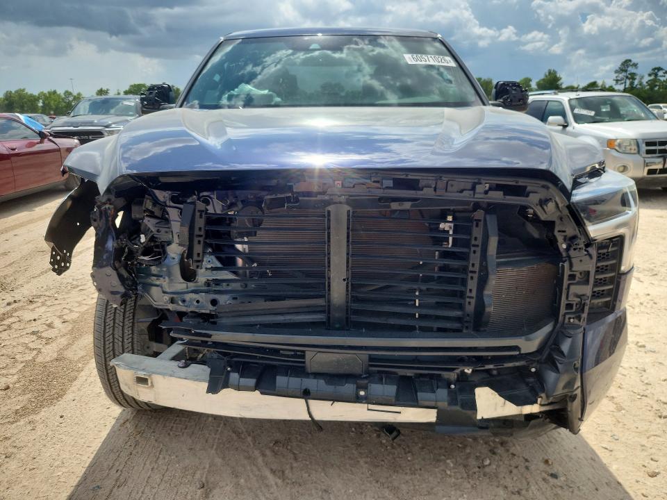 2025 Toyota Tundra VIN 5TFLA5DB8SX321166 COPART salvage auction — FRONT END, TX - SALVAGE VEHICLE TITLE, sold $21,100 on 2026-07-17 (photo 5)