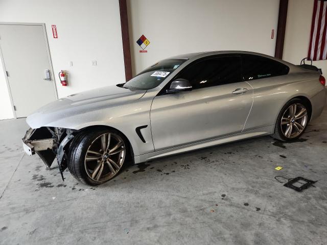 2014 BMW 4er VIN WBA3R1C57EK192056 COPART salvage auction — FRONT END, Fl - Cert Of Title Slvg Rebuildable, sold $550 on 2026-08-21 (photo 1)