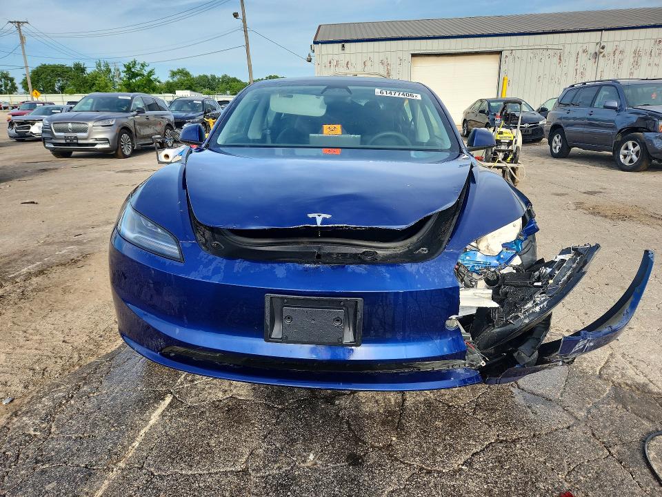2025 Tesla Model 3 VIN 5YJ3E1EAXSF038068 COPART salvage auction — REAR END, IL - CERTIFICATE OF TITLE, sold $10,700 on 2026-08-31 (photo 5)