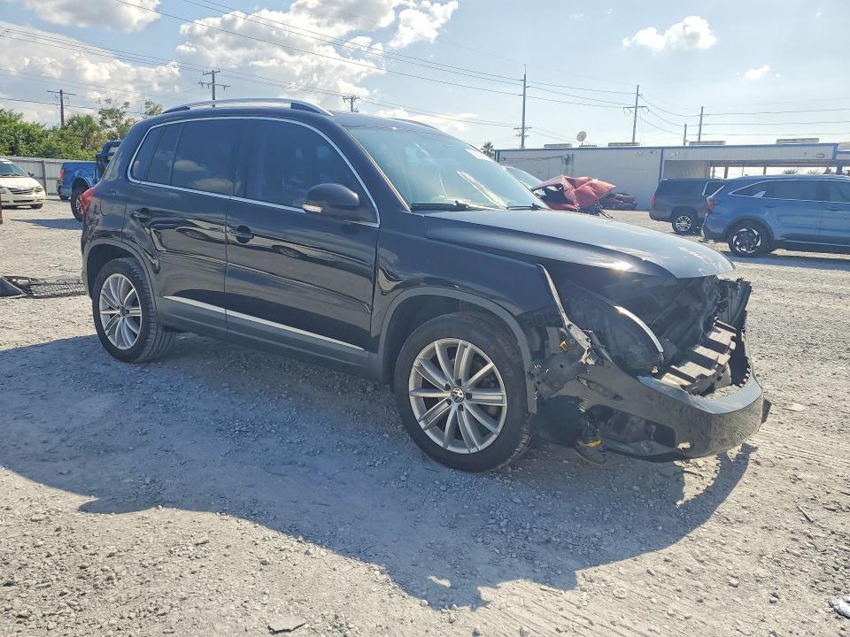 2015 Volkswagen Tiguan VIN WVGAV7AX6FW509764 COPART salvage auction — FRONT END, FL - CERT OF TITLE SLVG REBUILDABLE, sold $1,300 on 2026-08-07 (photo 4)