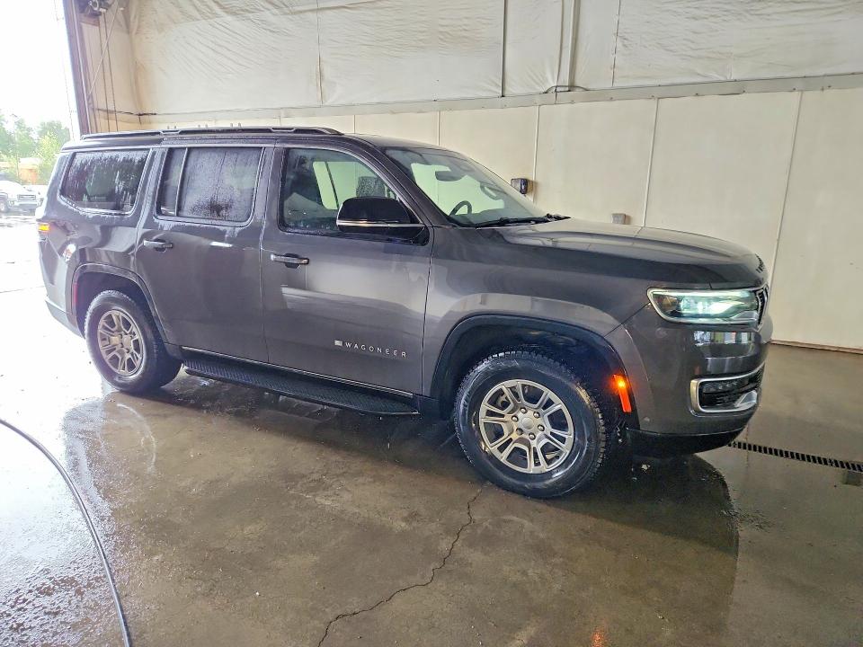 2023 Jeep Grand wagoneer VIN 1C4SJVAT6PS526157 COPART salvage auction — NORMAL WEAR, Ak - Certificate Of Vehicle Title, sold $39,750 on 2026-08-04 (photo 4)