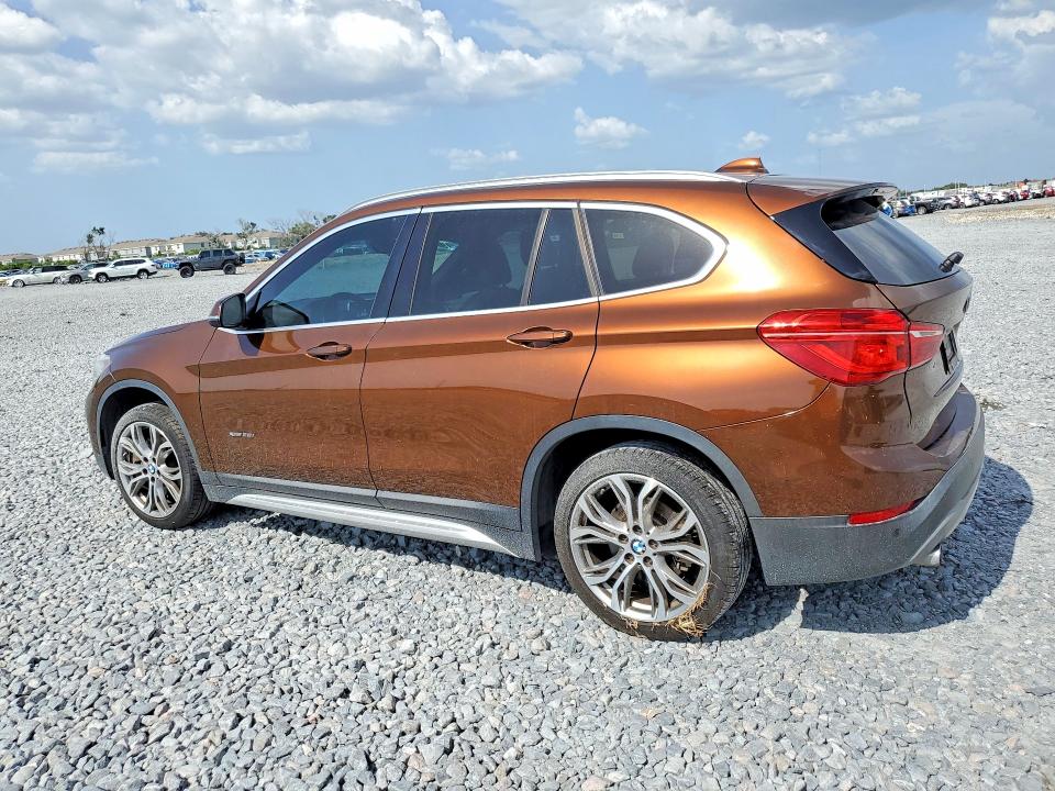 2016 BMW X1 VIN WBXHT3C36GP885519 COPART salvage auction — SIDE, Fl - Cert Of Title Slvg Rebuildable, sold $2,300 on 2026-07-31 (photo 2)