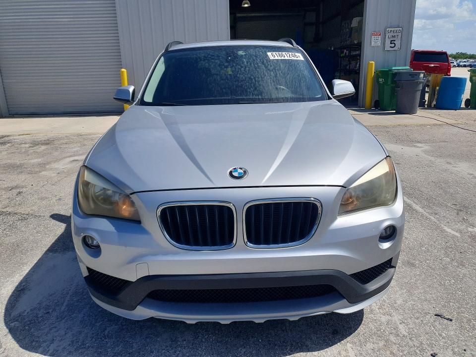 2015 BMW X1 VIN WBAVM1C54FV316422 COPART salvage auction — MINOR DENT/SCRATCHES, Fl - Certificate Of Title (P), sold $125 on 2026-07-29 (photo 5)