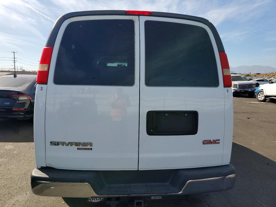 2013 Gmc Savana VIN 1GJZ71FA6D1164855 COPART salvage auction — MINOR DENT/SCRATCHES, Ca - Dis/Dlr/Exp Only Clean Title, sold $2,650 on 2026-08-03 (photo 6)