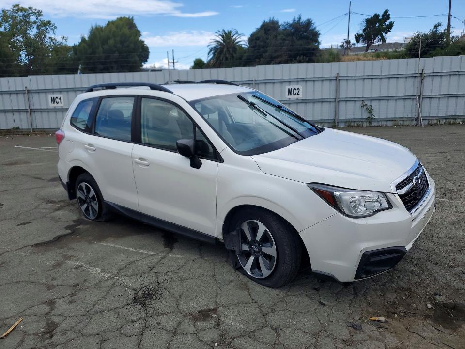 2017 Subaru Forester VIN JF2SJABC9HH586554 COPART salvage auction — ROLLOVER, CA - SALVAGE CERTIFICATE, sold $675 on 2026-07-24 (photo 4)