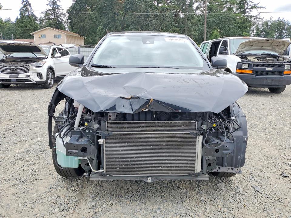 2022 Toyota Corolla cross VIN 7MUAAABG6NV015971 COPART salvage auction — FRONT END, Wa - Aff In Lieu Of Title - Rebuilt, sold $6,400 on 2026-07-07 (photo 5)