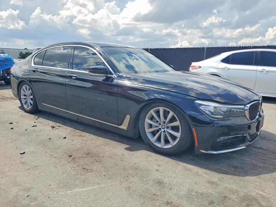 2018 BMW 7er VIN WBA7E4C50JGV23989 COPART salvage auction — MINOR DENT/SCRATCHES, In - Certificate Of Title, sold $7,800 on 2026-07-28 (photo 4)