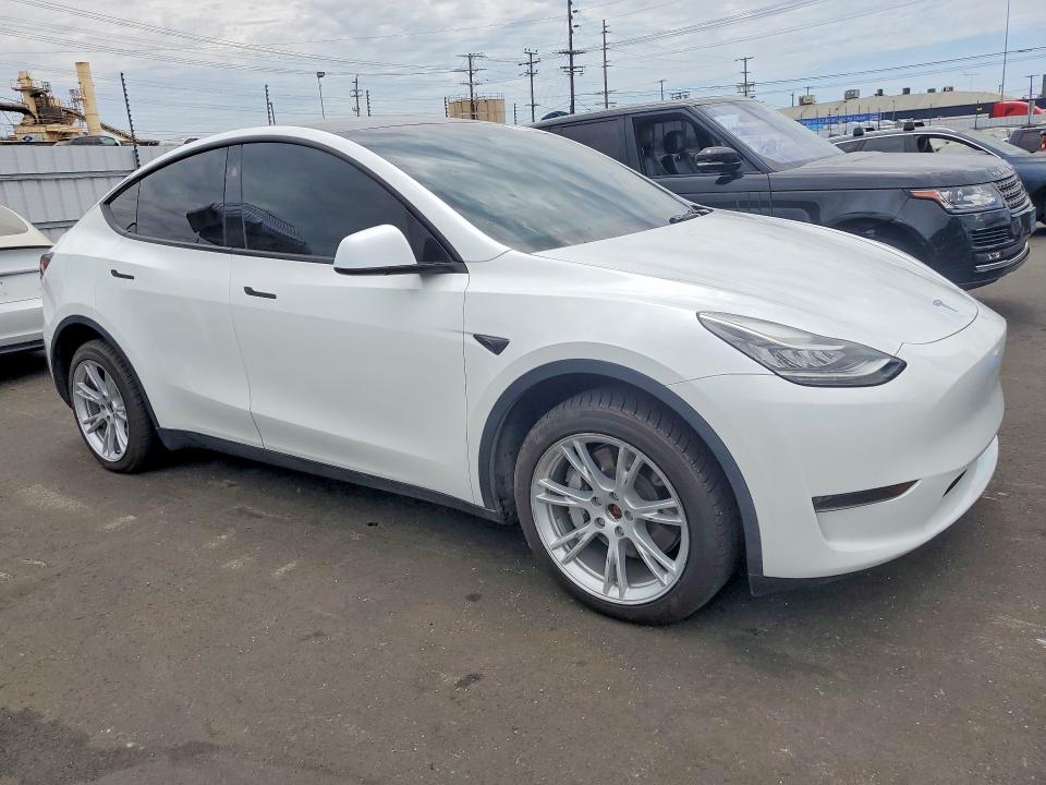2023 Tesla Model y VIN 7SAYGDEE0PA154245 COPART salvage auction — REAR END, Ca - Salvage Certificate, sold $9,100 on 2026-07-15 (photo 4)