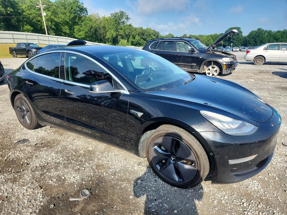 2019 Tesla Model 3 VIN 5YJ3E1EA5KF325138 COPART salvage auction — MINOR DENT/SCRATCHES, Mt - Dealer Only Clean Title (P), sold $5,700 on 2026-07-29 (photo 4)