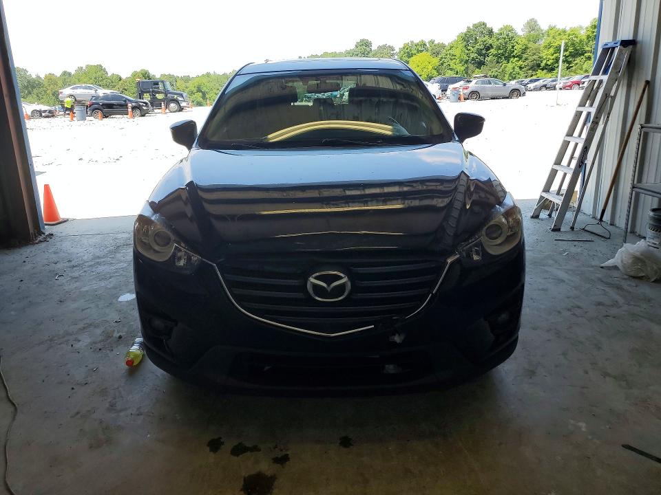 2016 Mazda Cx-5 VIN JM3KE2DY9G0845453 COPART salvage auction — FRONT END, Nc - Salvage Certificate Of Title, sold $350 on 2026-07-29 (photo 5)