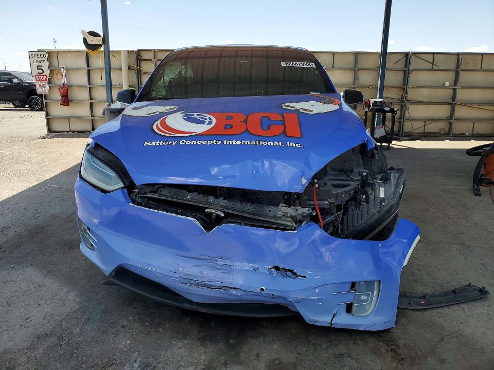 2021 Tesla Model x VIN 5YJXCDE20MF320515 COPART salvage auction — FRONT END, TX - SALVAGE VEHICLE TITLE (P), sold $6,100 on 2026-07-24 (photo 5)