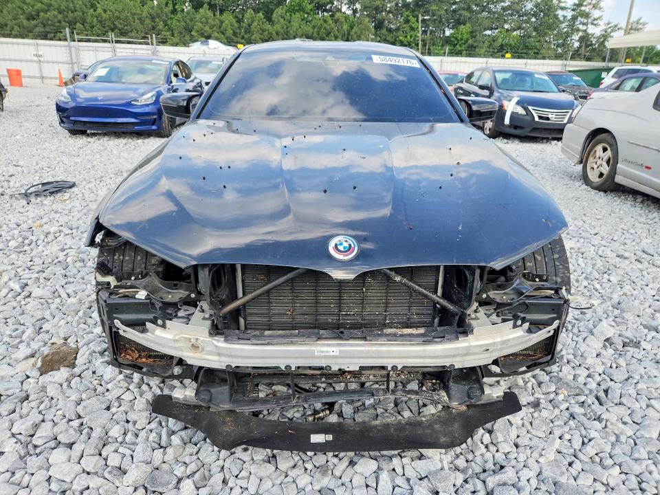 2022 BMW VIN WBS83CH03NCK38858 COPART salvage auction — FRONT END, GA - CERT OF TITLE-SALVAGE (P), sold $10,600 on 2026-07-30 (photo 5)