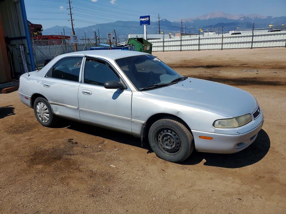 1993 Mazda 626 VIN 1YVGE22A8P5238140 COPART salvage auction — MINOR DENT/SCRATCHES, Co - Dis/Dlr/Exp Only Clean Title, sold $250 on 2026-07-22 (photo 4)