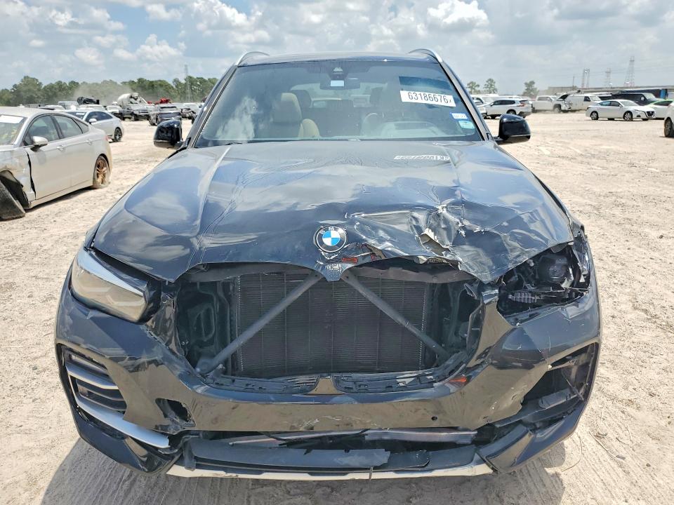 2021 BMW X5 VIN 5UXCR4C08M9G22015 COPART salvage auction — FRONT END, TX - SALVAGE VEHICLE TITLE, sold $17,000 on 2026-07-31 (photo 5)