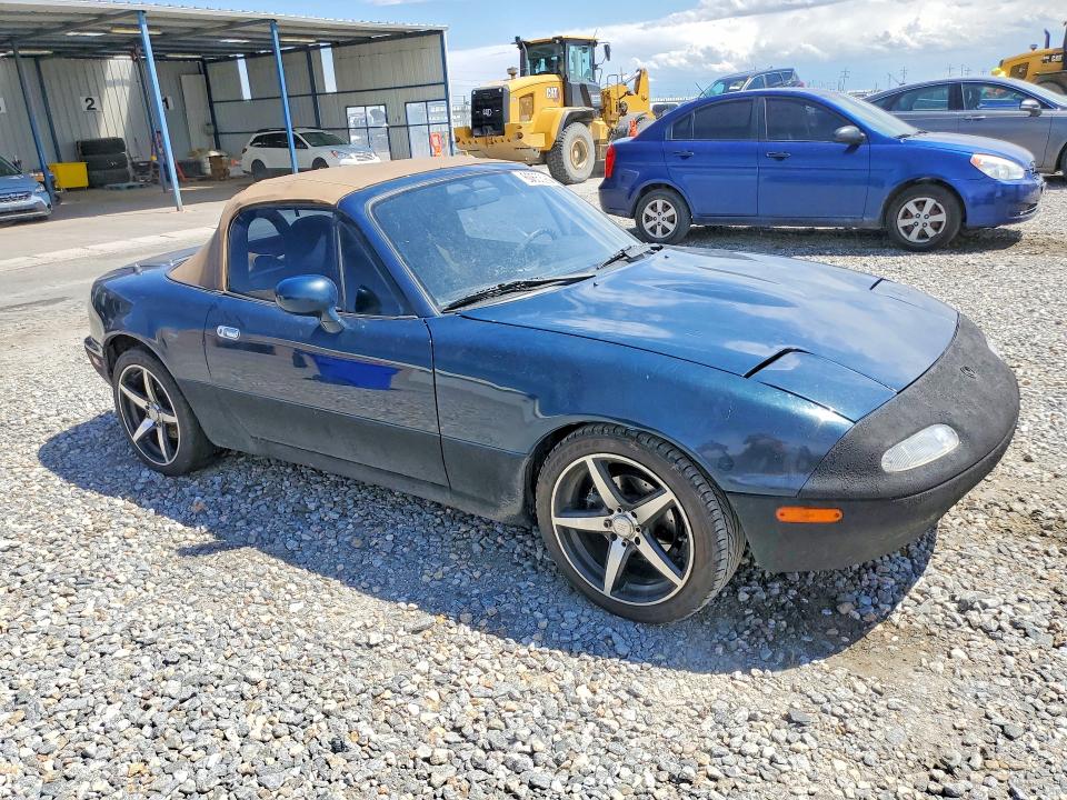 1994 Mazda Mx-5 VIN JM1NA3531R0516033 COPART salvage auction — MINOR DENT/SCRATCHES, Co - Dis/Dlr/Exp Only Clean Title, sold $2,600 on 2026-07-14 (photo 4)