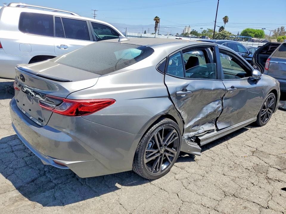 2026 Toyota Camry VIN 4T1DAACK6TU305741 COPART salvage auction — SIDE, Salvage Title, sold $18,400 on 2026-09-08 (photo 3)