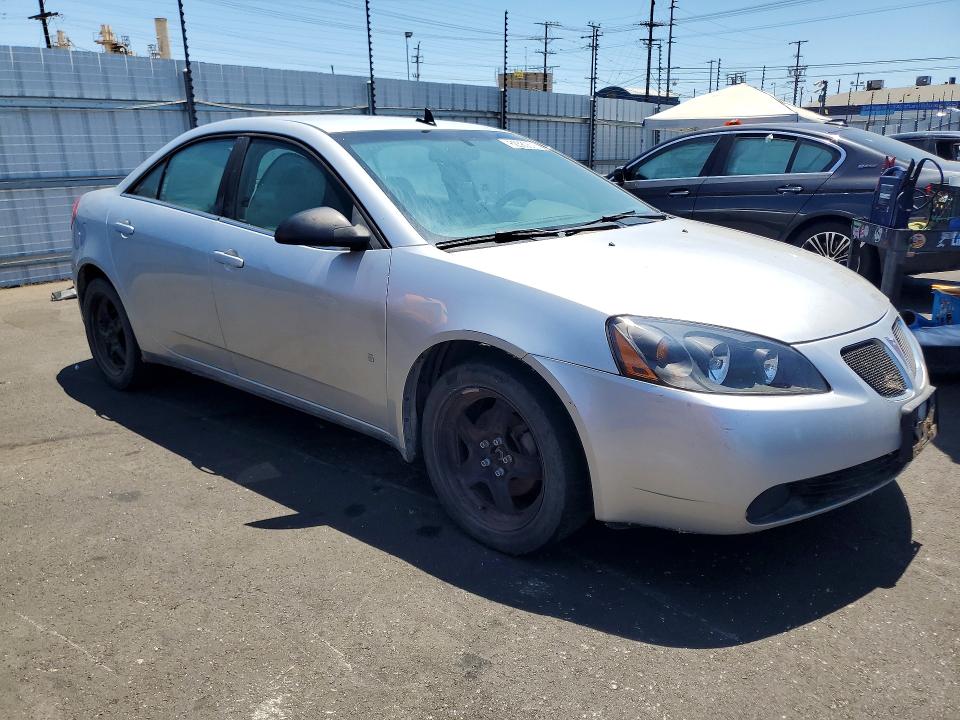 2009 Pontiac G6 VIN 1G2ZG57B494151263 COPART salvage auction — MINOR DENT/SCRATCHES, Ca - Dis/Dlr/Exp Clean W/Salv Hist, sold $225 on 2026-07-27 (photo 4)