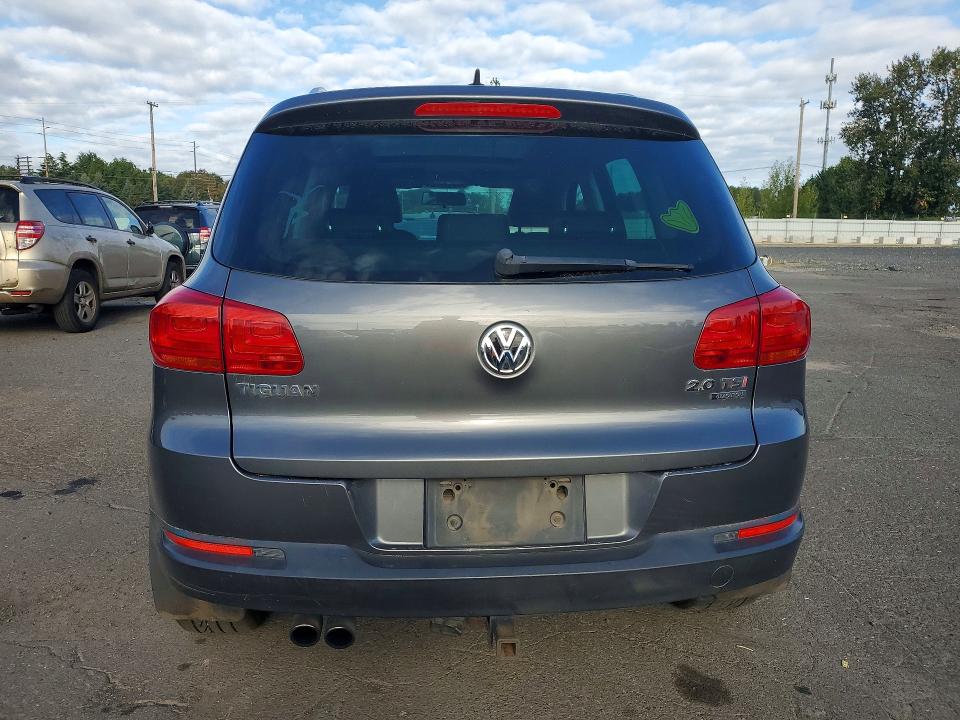 2013 Volkswagen Tiguan VIN WVGBV3AX6DW588847 COPART salvage auction — MINOR DENT/SCRATCHES, Or - Certificate Of Title, sold $1,700 on 2026-08-10 (photo 6)