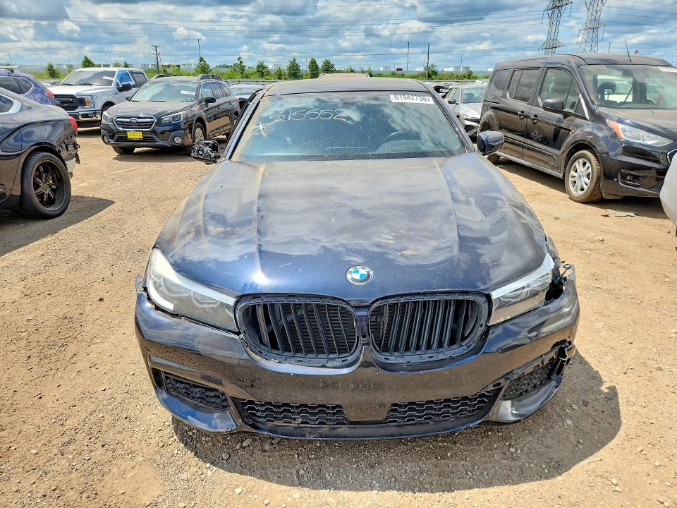 2017 BMW 7er VIN WBA7E4C57HGU99328 COPART salvage auction — SIDE, In - Certificate Of Title (P), sold $2,950 on 2026-08-13 (photo 5)