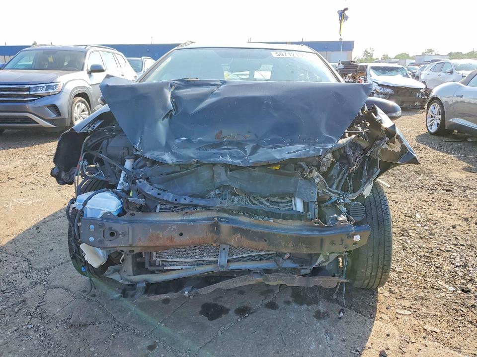 2012 Toyota Prius c VIN JTDKDTB35C1508484 COPART salvage auction — FRONT END, Mi - Certificate Of Title, sold $500 on 2026-07-31 (photo 5)