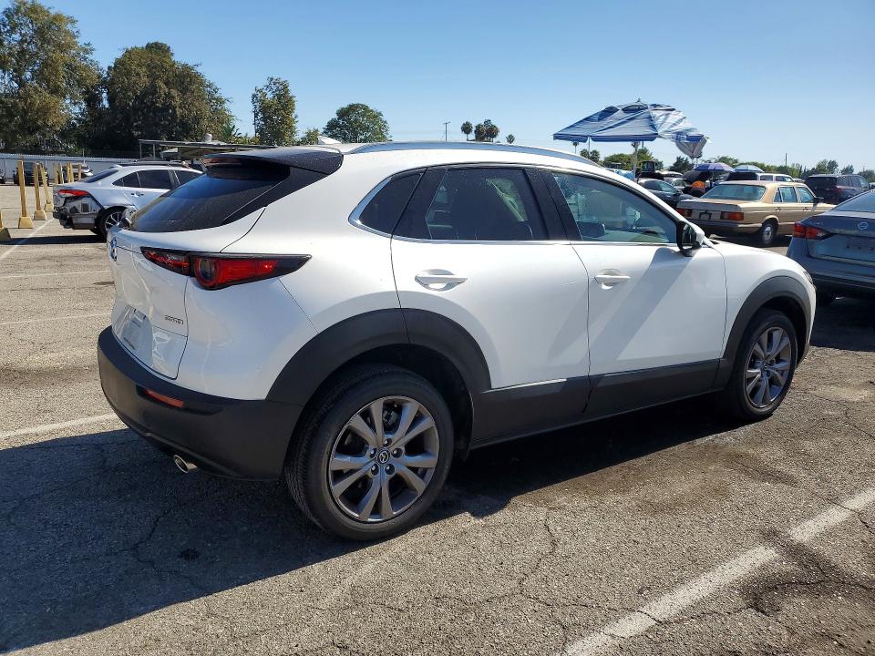 2023 Mazda Cx-30 VIN 3MVDMBDM0PM556863 COPART salvage auction — SIDE, Ca - Salvage Certificate, sold $8,100 on 2026-08-28 (photo 3)