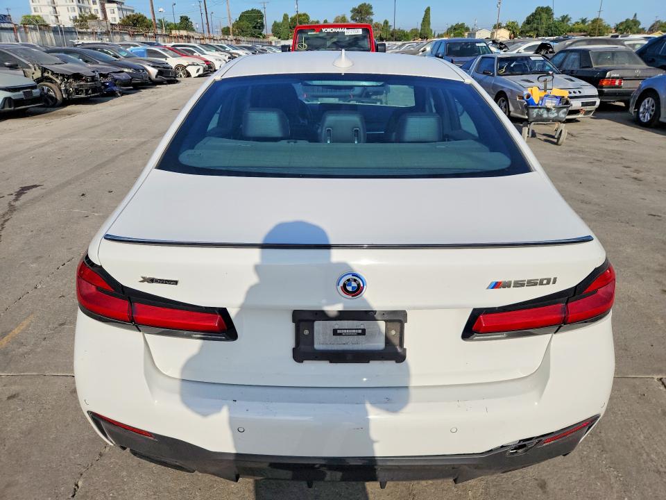 2023 BMW M5 VIN WBA13BK06PCM40203 COPART salvage auction — REAR END, CA - DIS/DLR/EXP ONLY CLEAN TITLE, sold $20,600 on 2026-07-29 (photo 6)